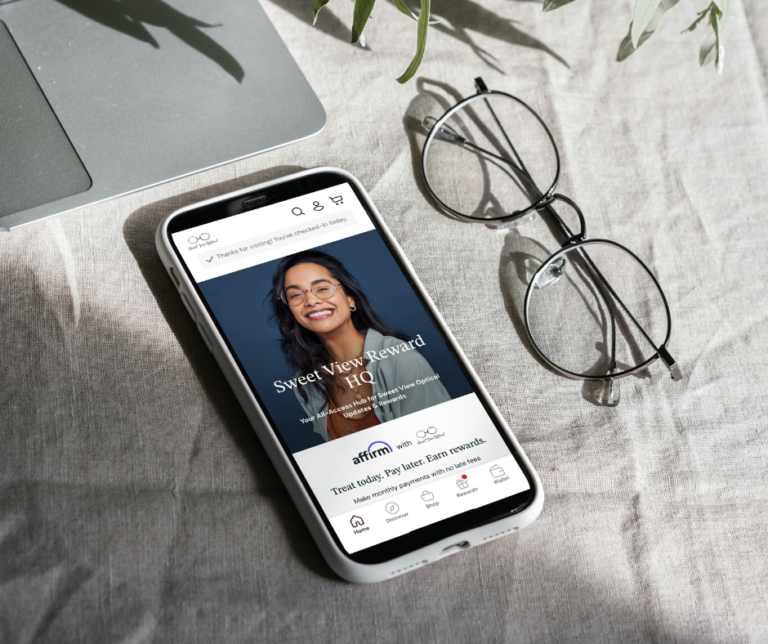 Exclusive eyewear app perks on display with luxury frames at Sweet View Optical.