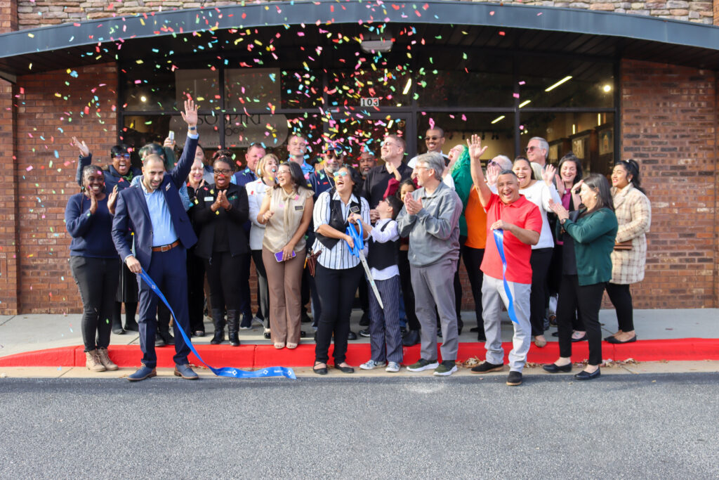 Sweet View Optical grand opening ribbon cut with confetti blitz