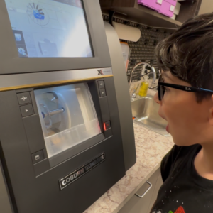 Students learning optical science through hands-on demonstrations in a supervised lab